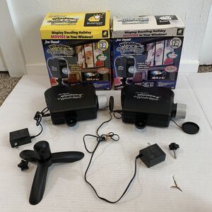 Star Shower Projector Window Wonderland 12 Christmas Halloween Movies LOT OF 2
